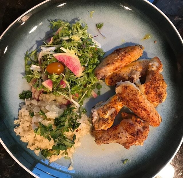 Who says chicken wings are just for sports bars?! Organic and baked with some mixed raw colors and riced cauliflower is always a home run. #improveguthealth